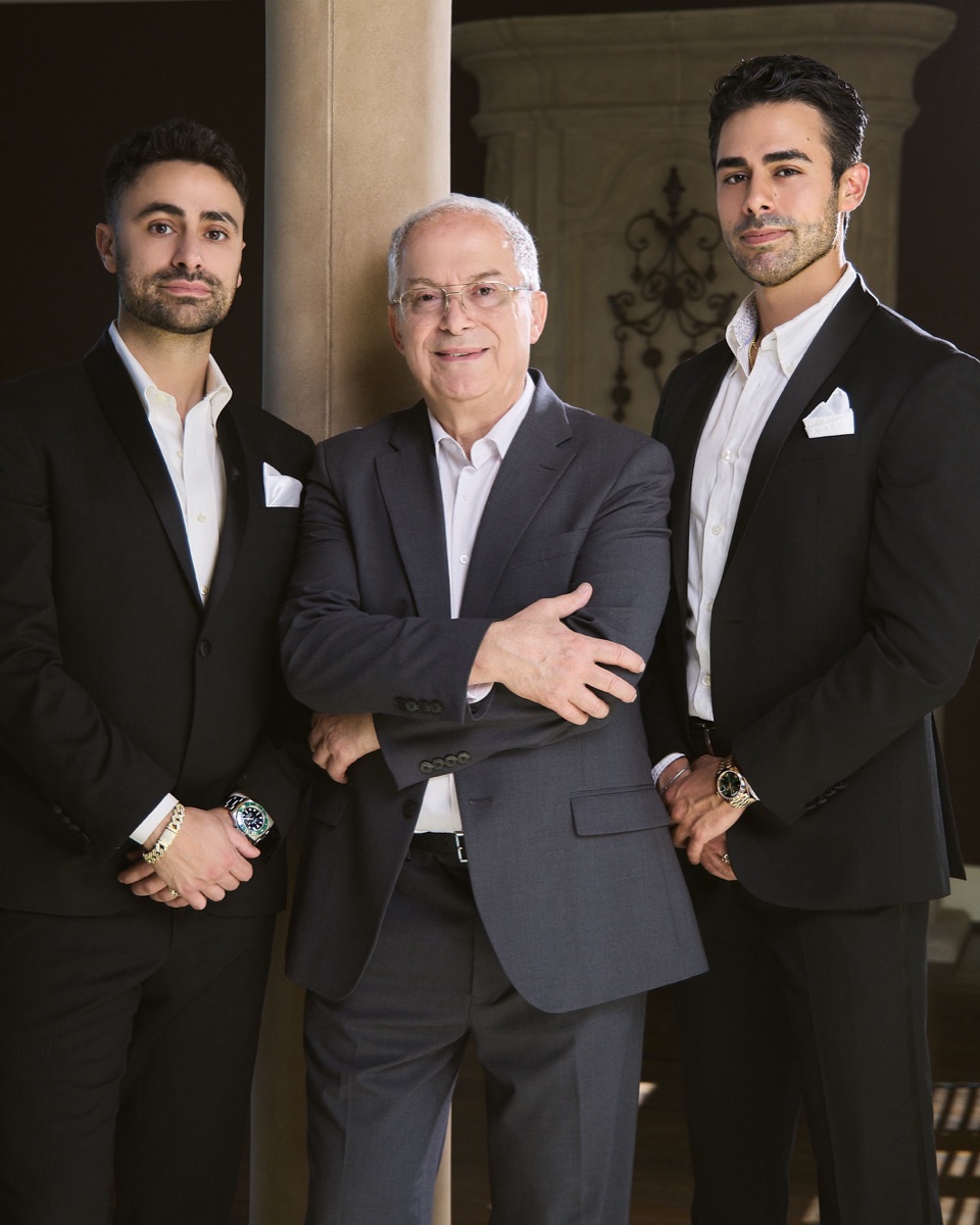 Louis George Nasr standing alongside his two sons, Nabeel and George, the founders of Louis G. Jewelry